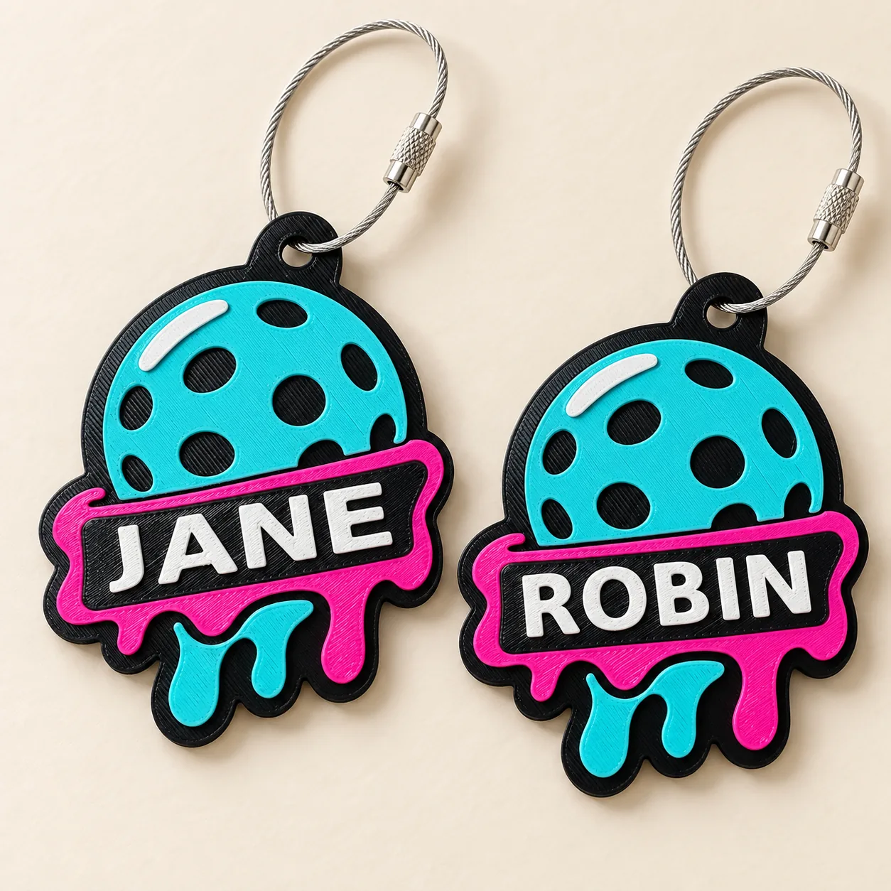 Two Rally Melt tags personalized with JANE and ROBIN