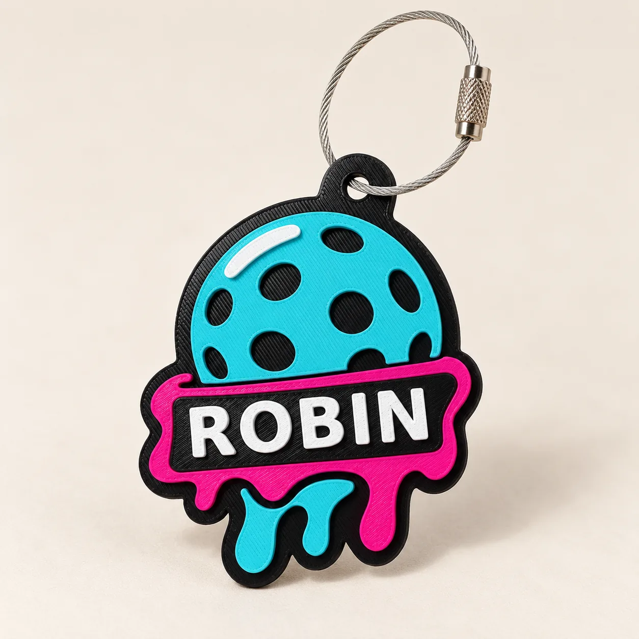 Rally Melt tag personalized with ROBIN on a light studio background